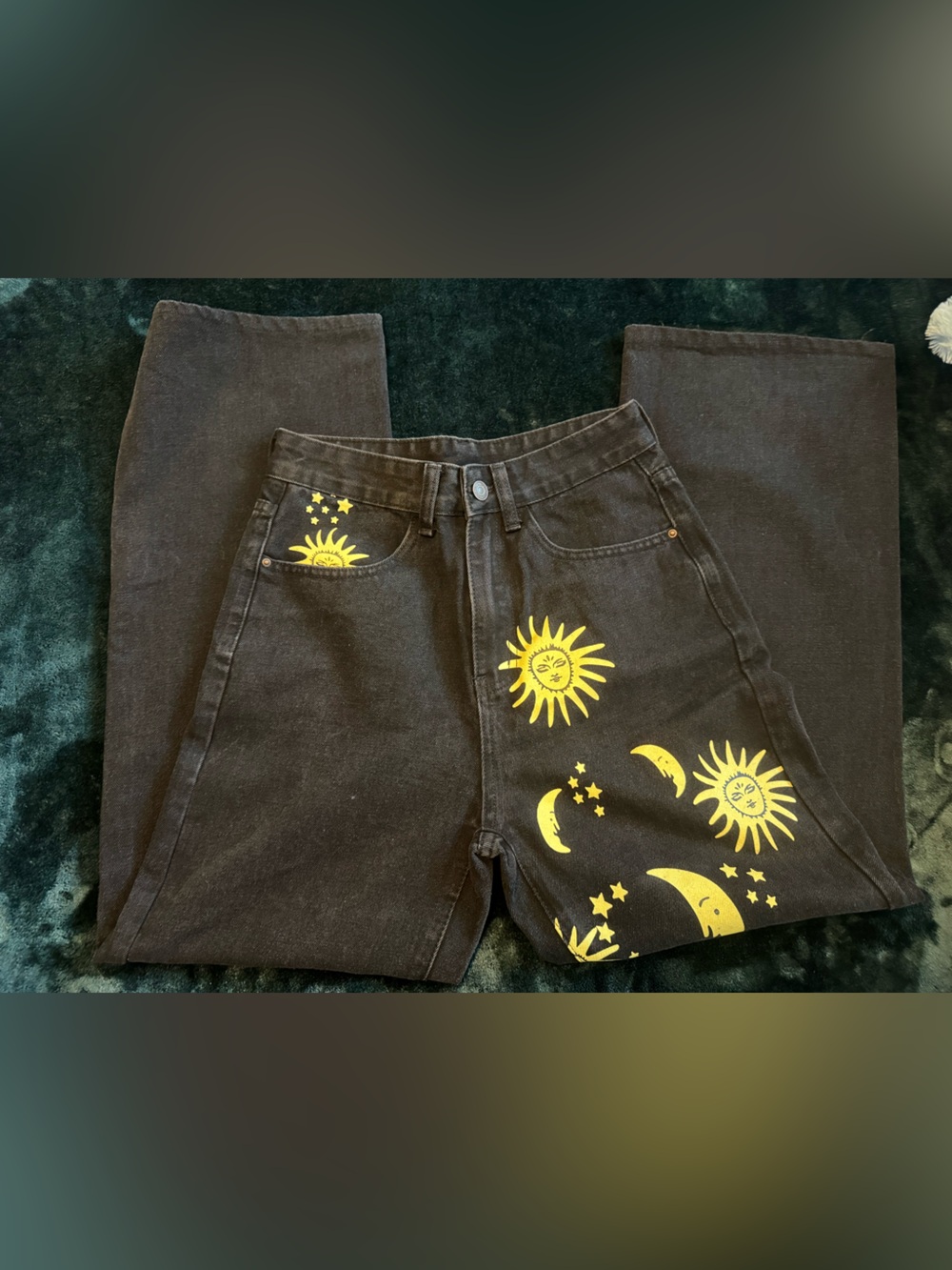 Black pants with yellow astronomy design